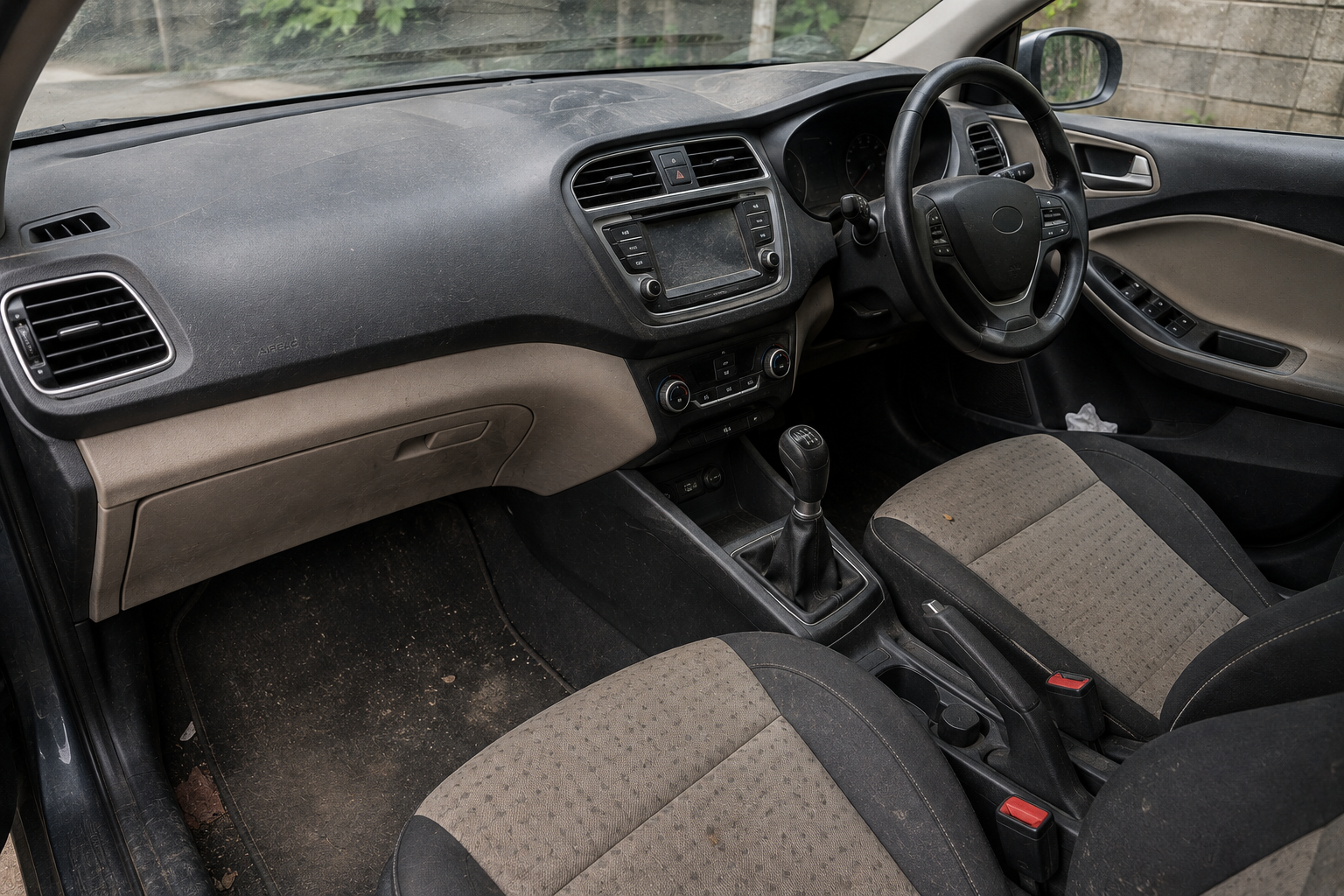 Car interior before professional cleaning